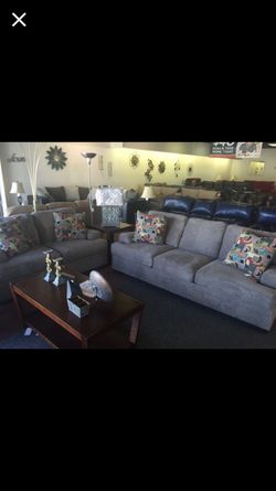 Grey Serta sofa and loveseat