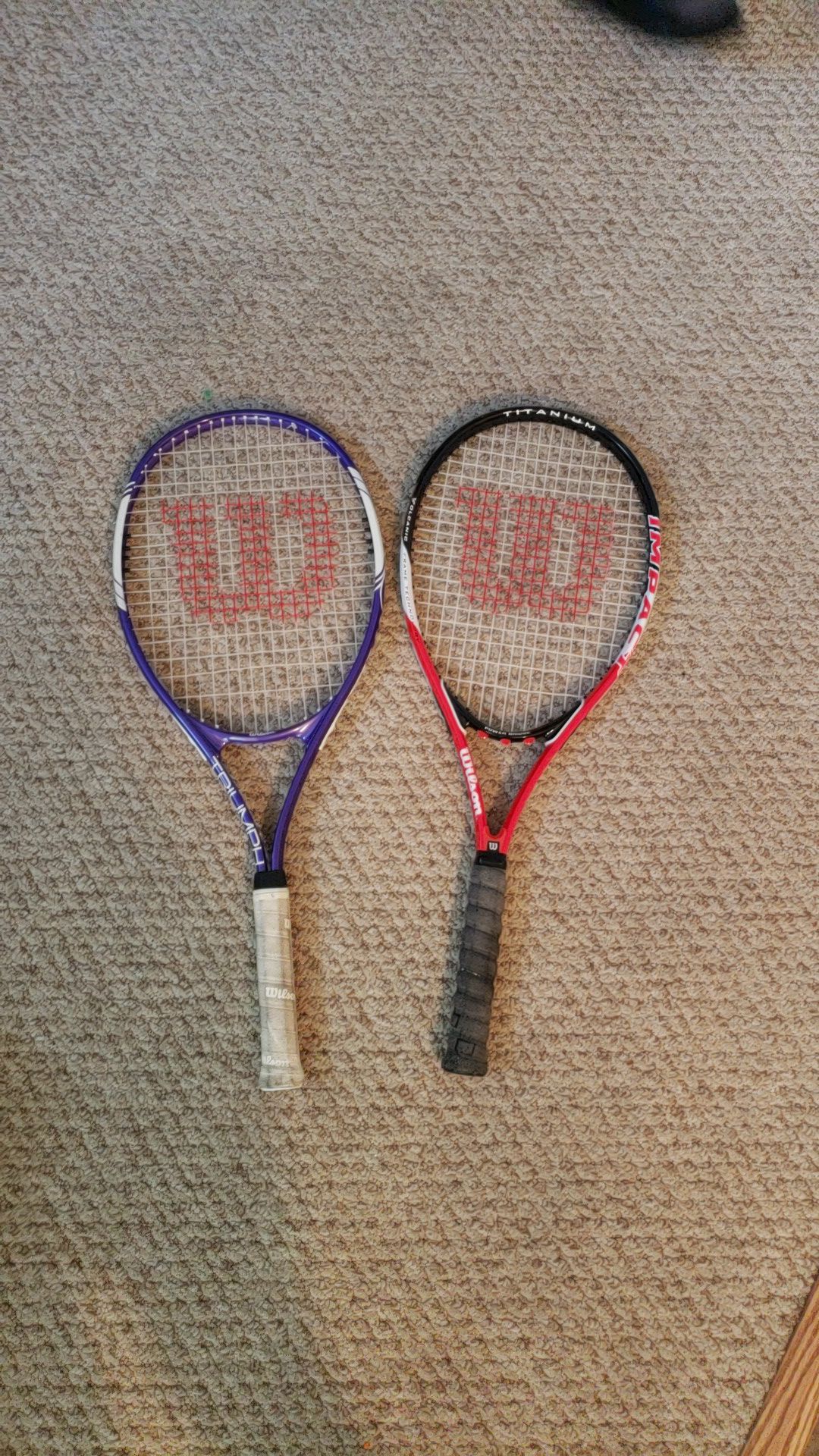 Wilson Triumph and Wilson Impact tennis rackets.
