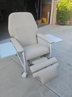 Mobil Leather wrapped recliner with built-in heat and massage