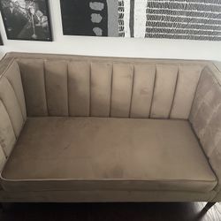 Beige velvet loveseat