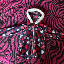 Navy blue sweater meant for cool weather designed for 2-3 year olds 