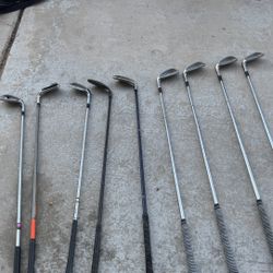 Mixed Set Of Golf Clubs