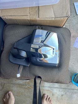 Original left side mirror 2013 Nissan NV Cargo