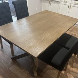 Table And Four Chairs