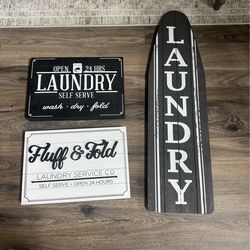 Wooden laundry pictures and ironing board shaped sign