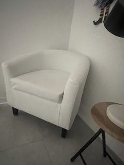 White faux leather chair
