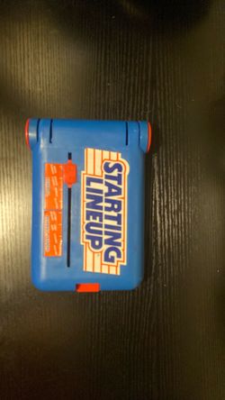 Starting line up.  Baseball card holder