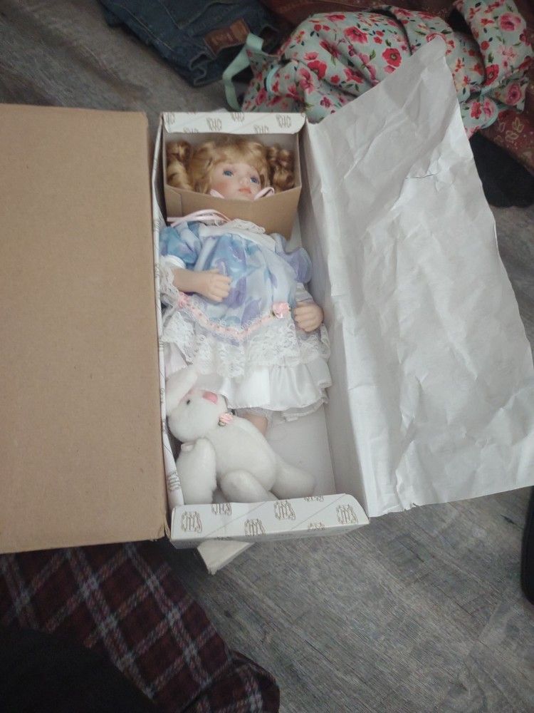 Amanda Holding Porcelain Doll
