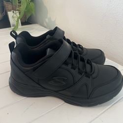 Never used girls skechers size 2