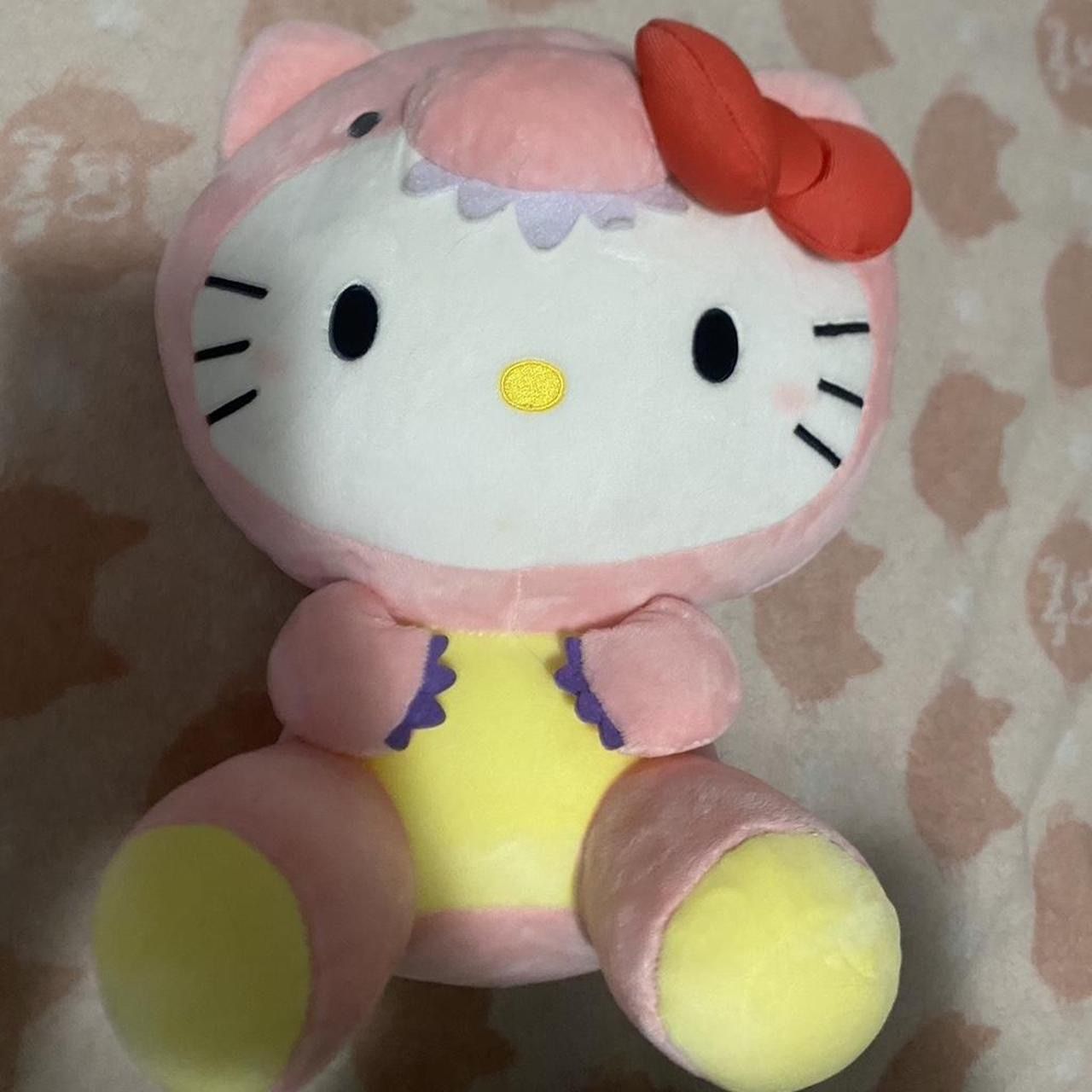 Hello kitty dino plushie
