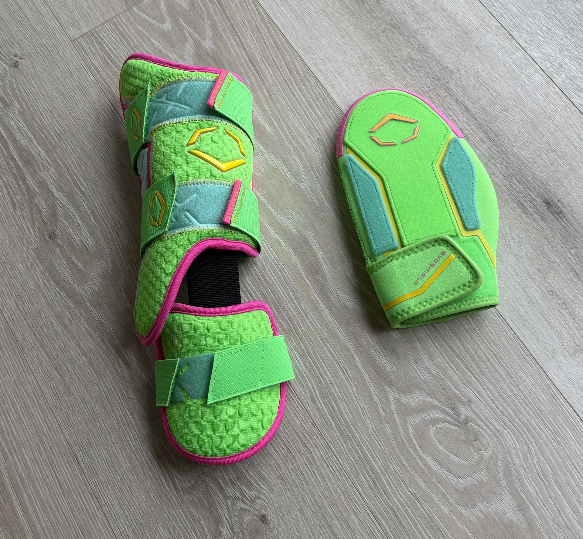 Brand new EvoShield Neon Sliding Mitt & Leg Guard Set