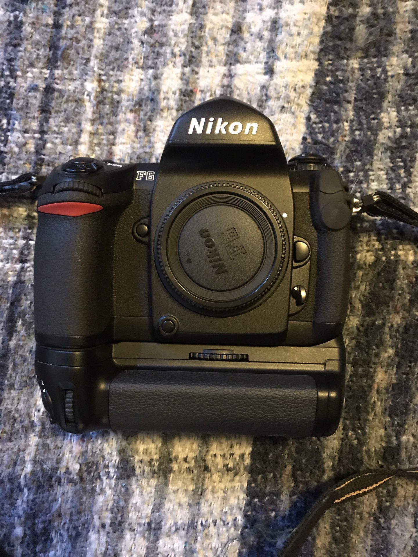 Nikon F6 with extended battery pack and parts