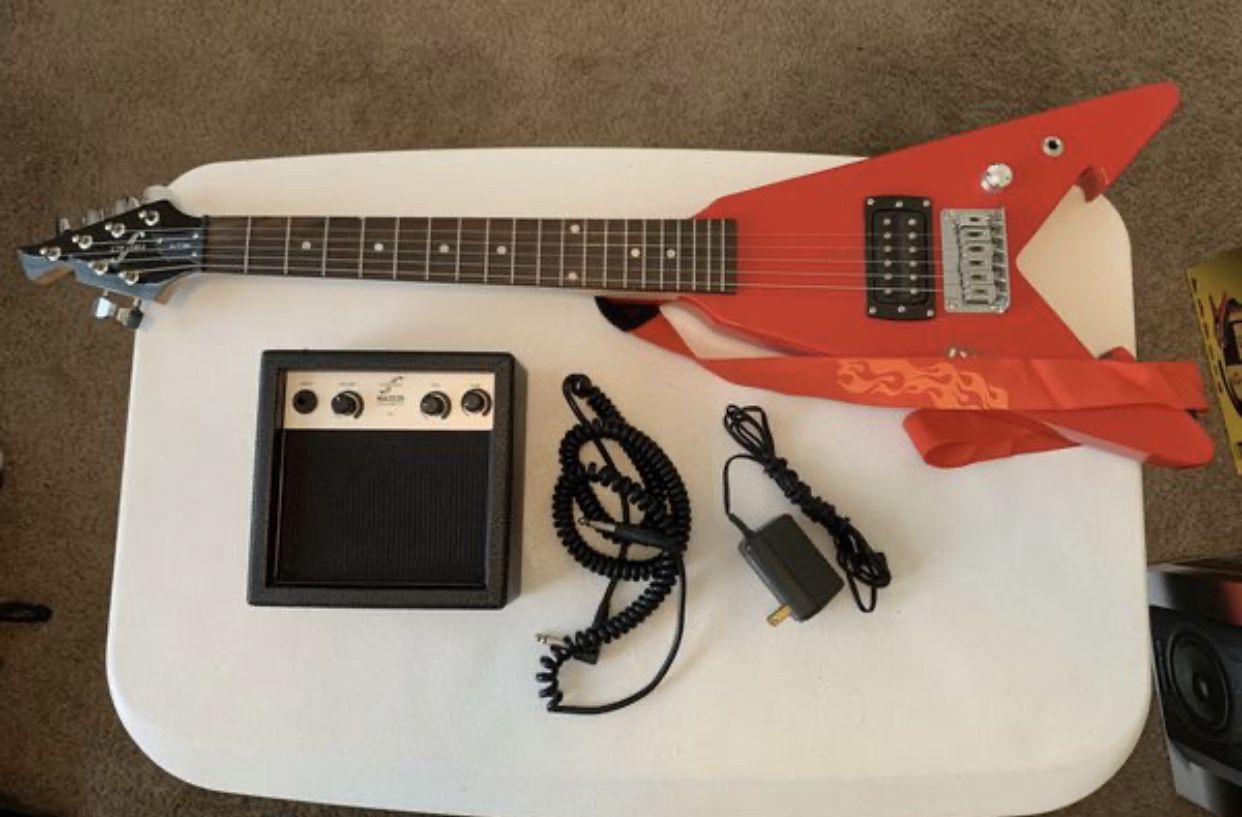 Kids Guitar: First Act Electric Guitar & Power Amplifier - ME279 -1 String is missing