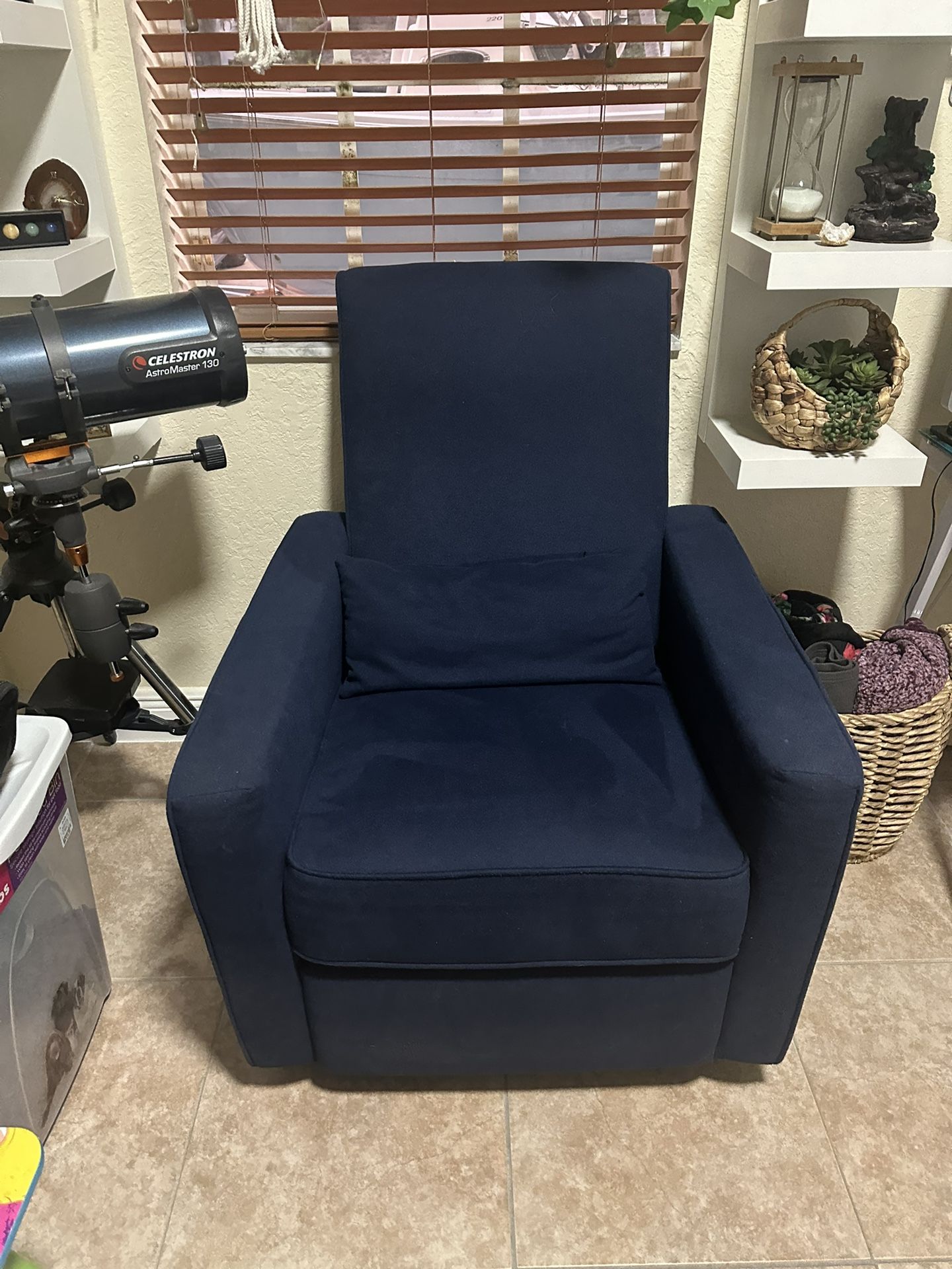 Rocking blue cushion chair