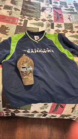 Seahawks Gear…. 1 Men’s XXL Nylon Pullover Plus 1 Mens Camo Cap