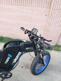 Big Fast Electric Bike 35mph 120miles range 00600 miles is $700! Can't afford it. I have small 20mph Ebike for $325! All black. Im willing to trade PS