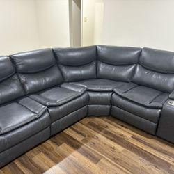 Luxurious Grey Leather Sectional Sofa with Recliners  $1650 