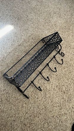 Black Metal Wall Shelf with Hooks
