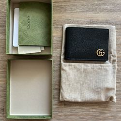 Gucci Bi-Fold Leather Wallet.