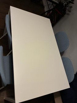 White Rectangular Dining Table with Four Chairs
