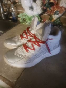 Boost hightop white tennis shoes in excellent condition size 9.5