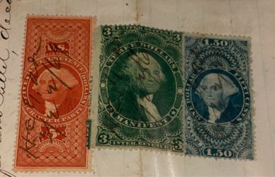 green $3 United States Internal Revenue stamp featuring a portrait of George Washington. These vintage US Internal Revenue stamps feature George Washi