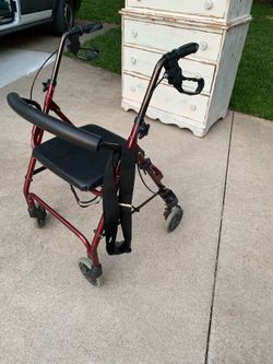 OC - rolling walker with seat and brakes