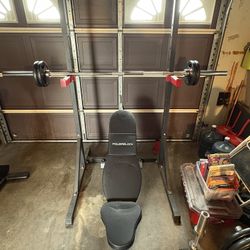 Squat Rack / Bench / Plates / Exercise Bike 