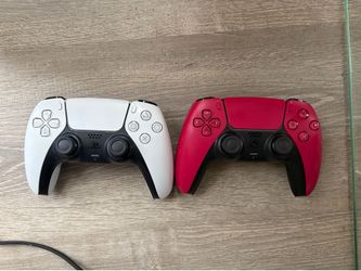PS5 Pro with disc drive and two controllers