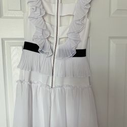 dresses for party or new cocktails ( The Black ) Size S of BEBE , And The White Is BCBG Size 2