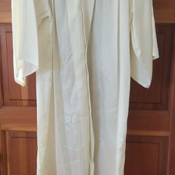 THREE  GRADUATION GOWNS AND TWO BLACK MATCHING CAPS