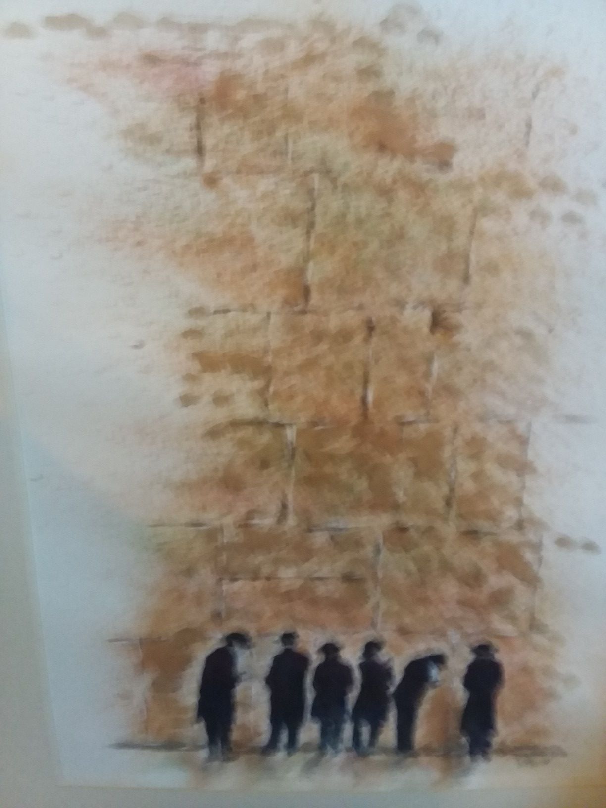 5 Jewish priest looking at a famous wall