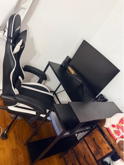 Gaming chair with gaming table and monitor