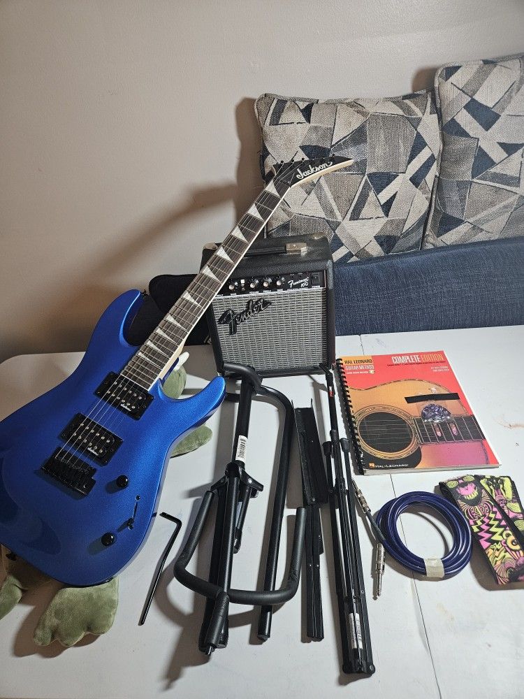 Jackson Electric Guitar with Fender Amp, Strap, Stands, plus more