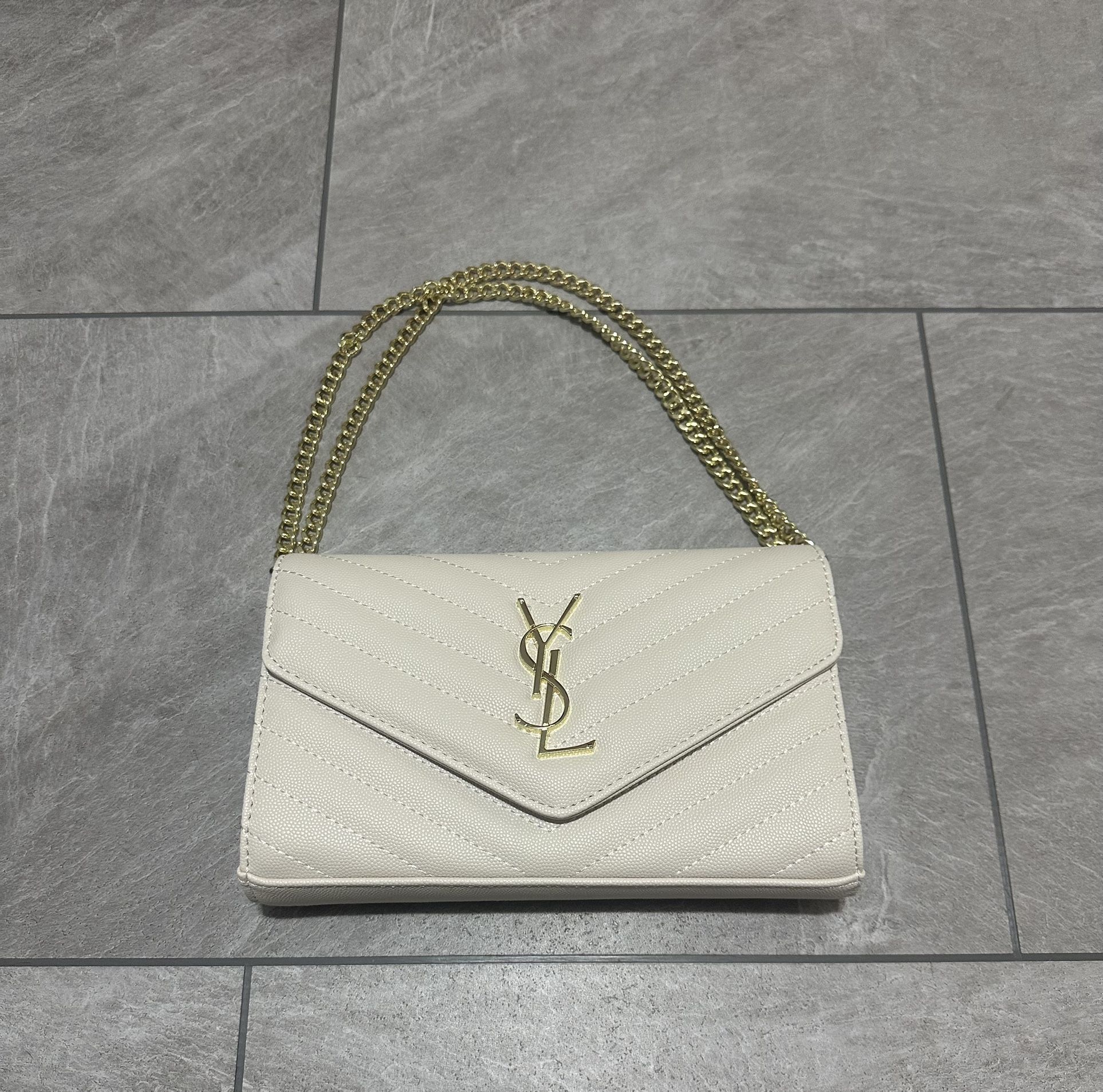 YSL handbag slightly used, no stains, rips, or tears. It’s in like new condition. Selling for $350 or best offer