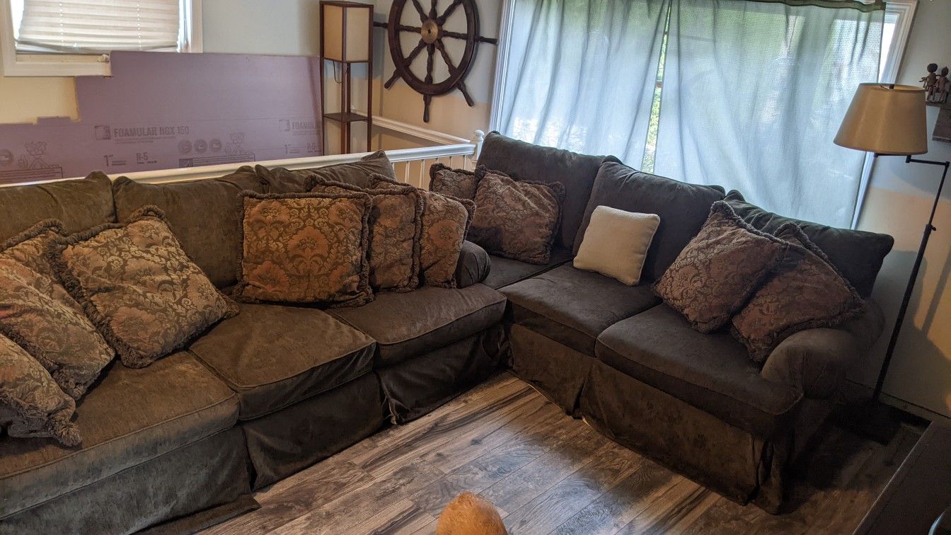 2 Couches With Pillows
