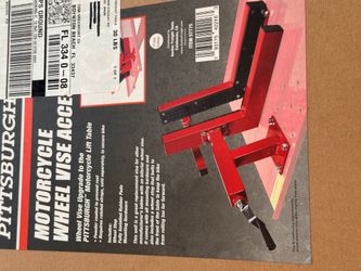 Motorcycle front wheel brace