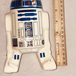 R2D2 Bank  (Stopper Missing)  6.75 Inches Tall 4” Wide No Chips Or Cracks. 