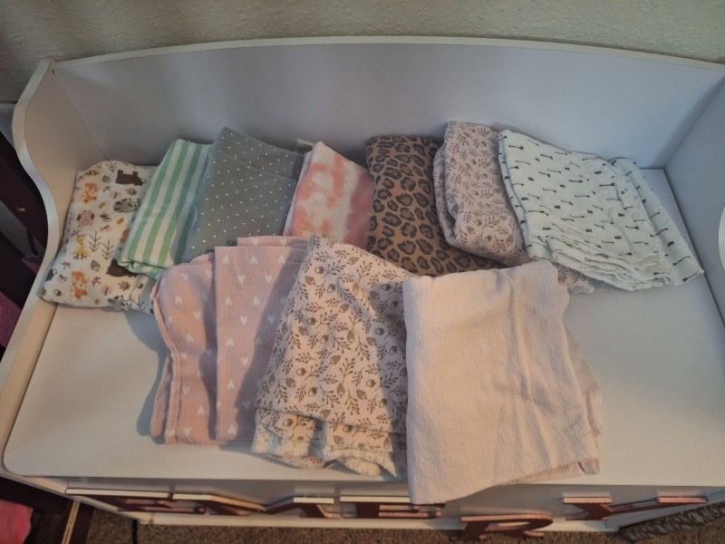 10 Receiving Blankets, 13 Bibs, 12 Burp Cloths, And 6 Towels