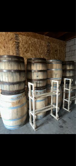 16 Used Oak Wine/Whiskey Barrels + 2 Heavy-Duty Steel Barrel Storage Racks