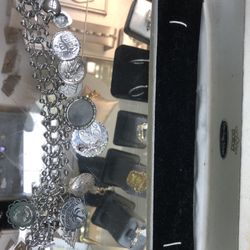 Stealing Silver 1940 Charm Bracelet 