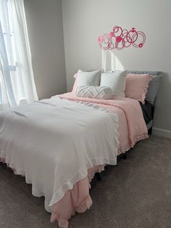 Bed with mattress and bedding included