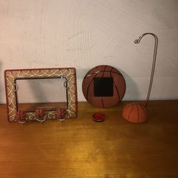 Basketball hook, pop socket, leather like small wall frame and an unique 4x6 picture frame with spinning basketballs. All in nearly new condition m