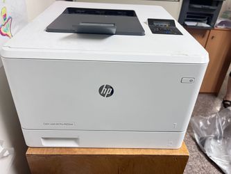 HP Color LaserJet Pro Printer Model: M452nw (leaves black ink smudges when printing)