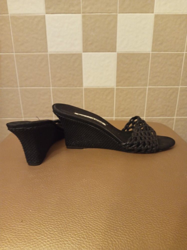 Manolo Blahnik Black Slip Ins , 9 1/2.( $10)
