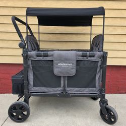 WonderFold W4 Elite Quad Stroller Wagon Charcoal Gray 4-Seater Foldable Wagon

Canopy