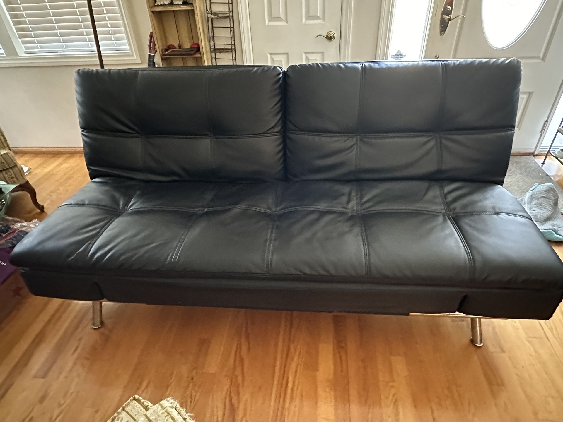 $140 – Futon Sofa Bed by Lifestyle Solutions | Black Faux Leather