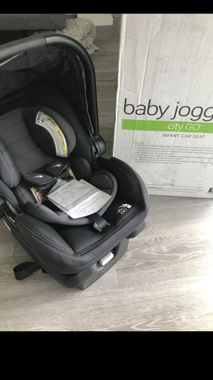 Brand New Baby Jogger City Go car seat with NEW City Mini stroller attachments