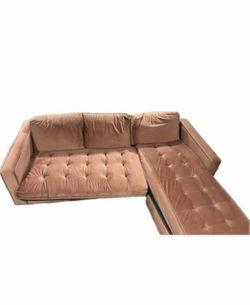 Pink sofa with chase