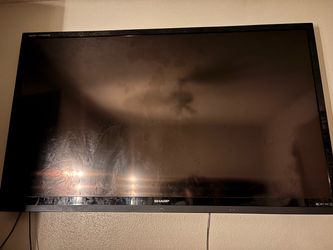 85 inch tv with mount and Roku